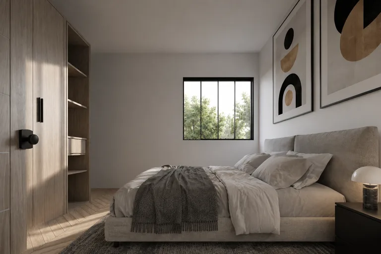 Bedroom with fitted wardrobes in a Babylon Residence apartment